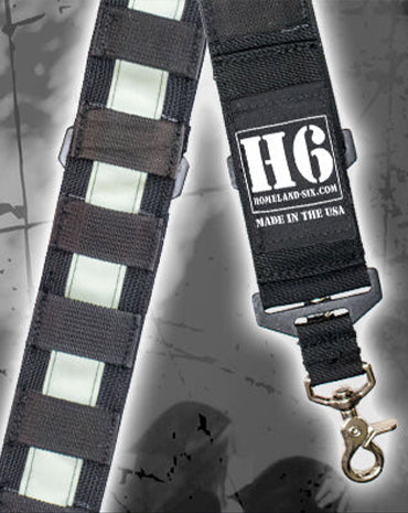 Black strap with reflective panels and 'H6' branding on a gray background